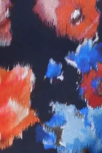 blusa estampada de flores de manga larga con volantes