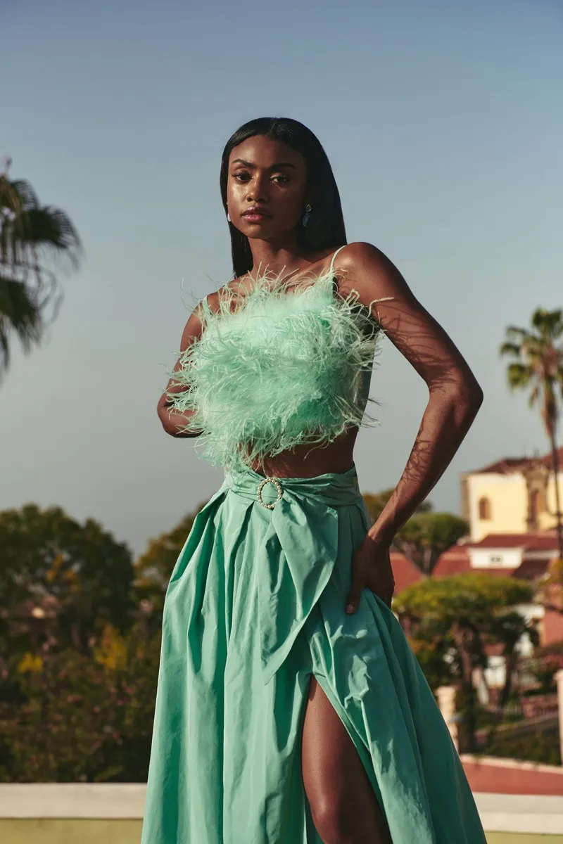Top de fiesta de plumas tafeta aguamarina