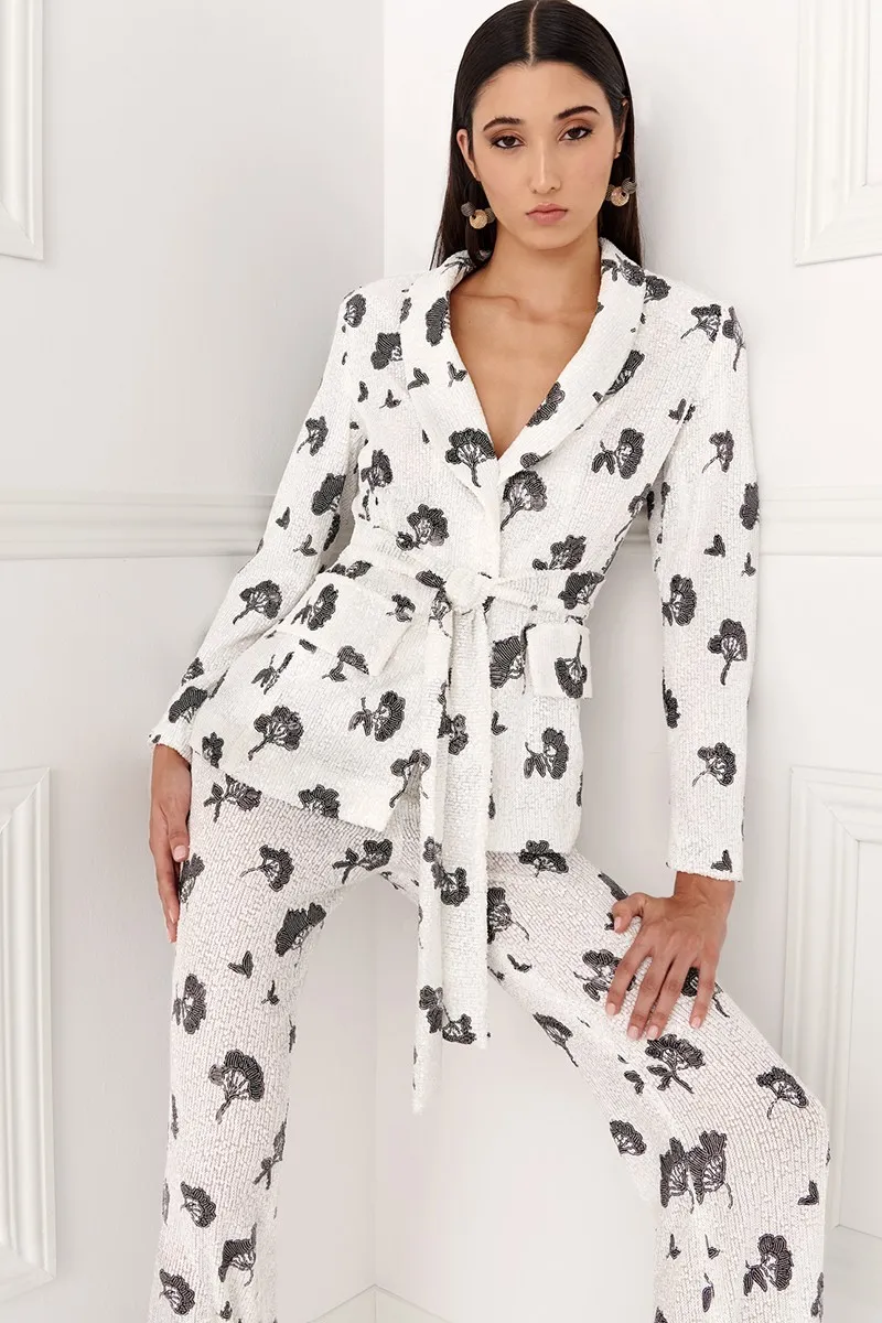 Chaqueta de lentejuelas blanca y negra para invitada