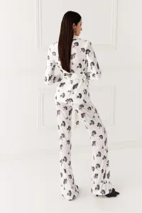 Chaqueta de lentejuelas blanca y negra para invitada
