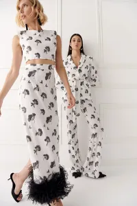 Chaqueta de lentejuelas blanca y negra para invitada