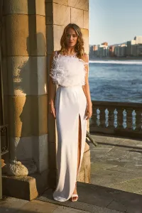 Top de plumas en blanco Roxanne