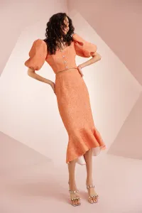 Falda con volante en brocado coral Mila