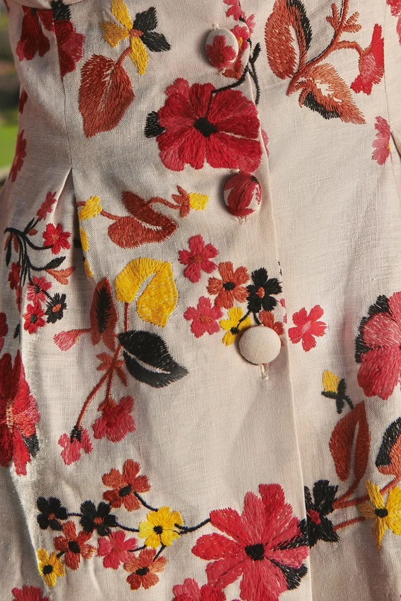 top manga jamón de lino con flores bordadas para invitadas