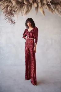 conjunto de top corto con boton joya y manga jamon y pantalon en