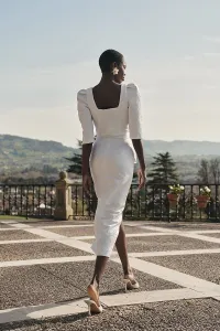 Falda brocada blanca midi joya con peplum