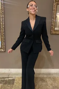 Traje de chaqueta con pantalón color blanco para novia civil