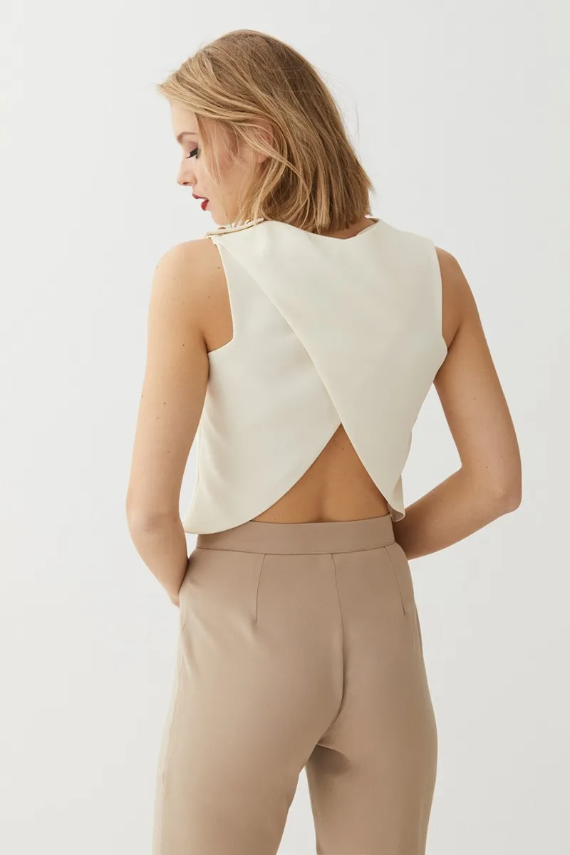 Pantalón Pitillo Aguamarina Dione y Top blanco crudo cruzado