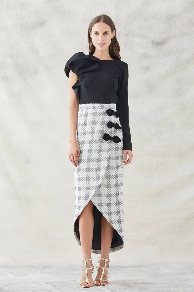 Top Abullonado y falda midi