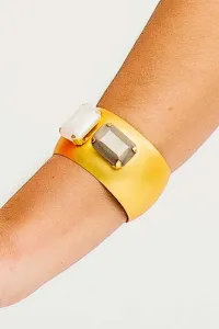 Pulsera dorada con piedras facetadas gris y blanca