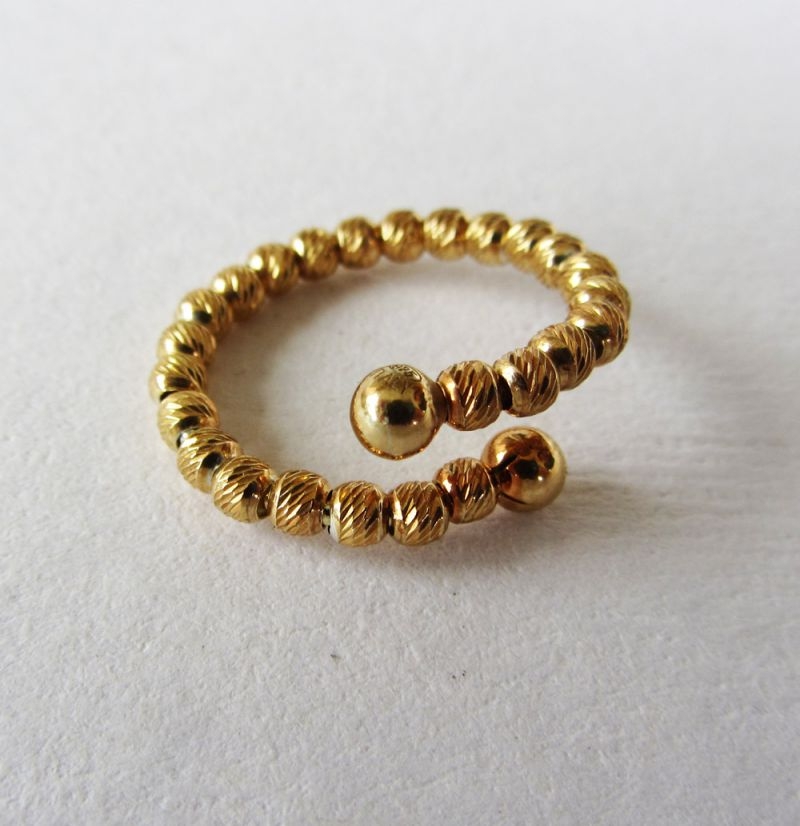 anillo bolas diamantadas oro amarillo