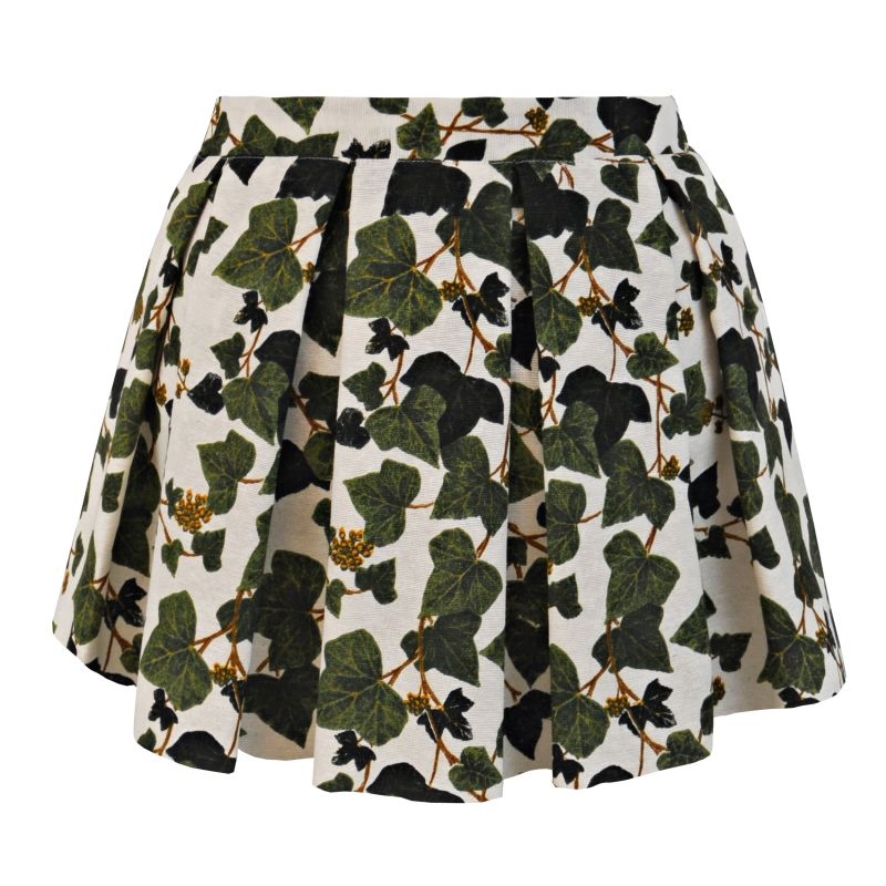 falda corta d evuelo con estampado de hojas verdes y fondo beige de jose matteos