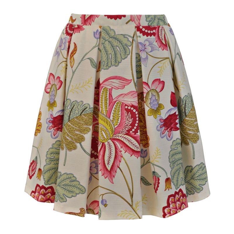 minifalda beige con estampado de flores verdes rosas amarillos con vuelo de jose matteos