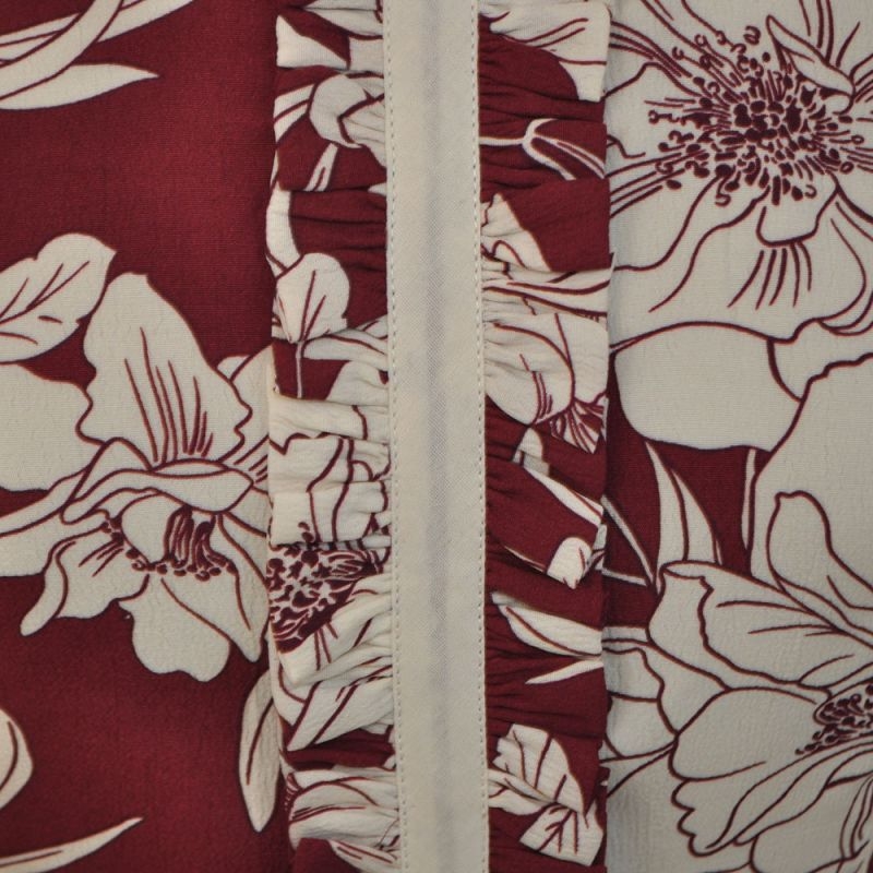 vestido granate corto d evuelo con flores beige de jose matteos