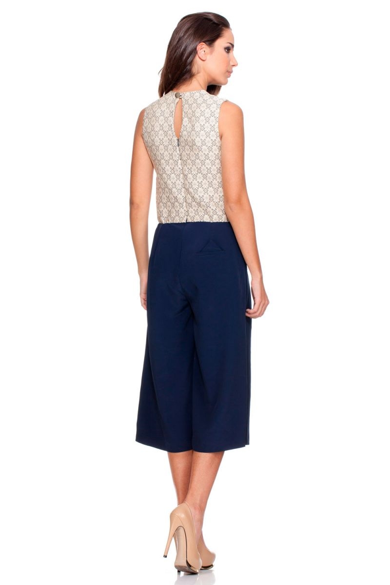 Mono con top de jacquard beige y pantalon ancho capri azul de rocknrom on line