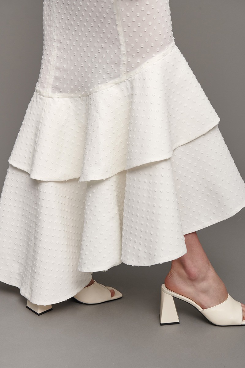 vestido novia de plumetti con  volantes en la falda y manga abullonada largo midi  novia 2021