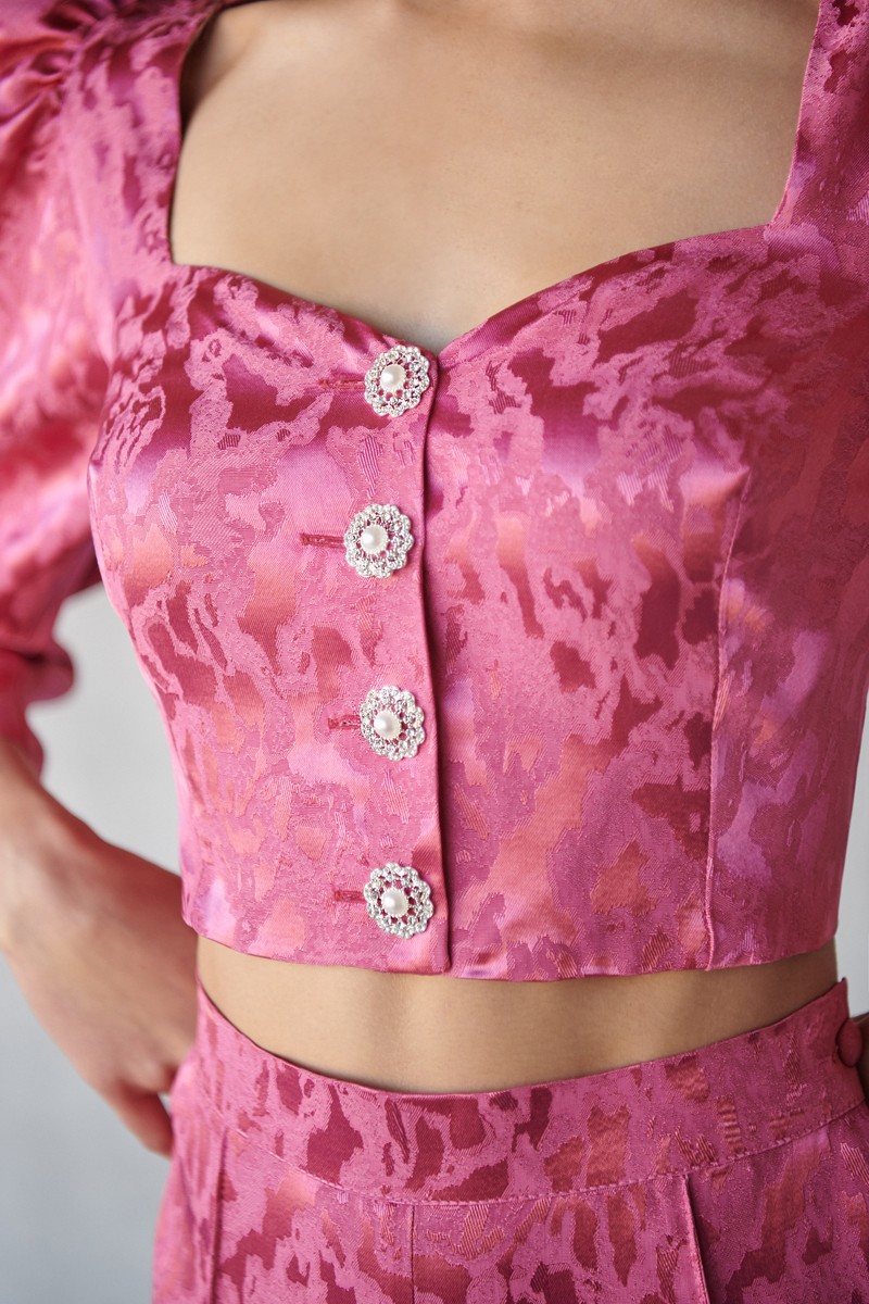 Conjunto de pantalon palazzo y top corto con botones joya en rosa comprar online