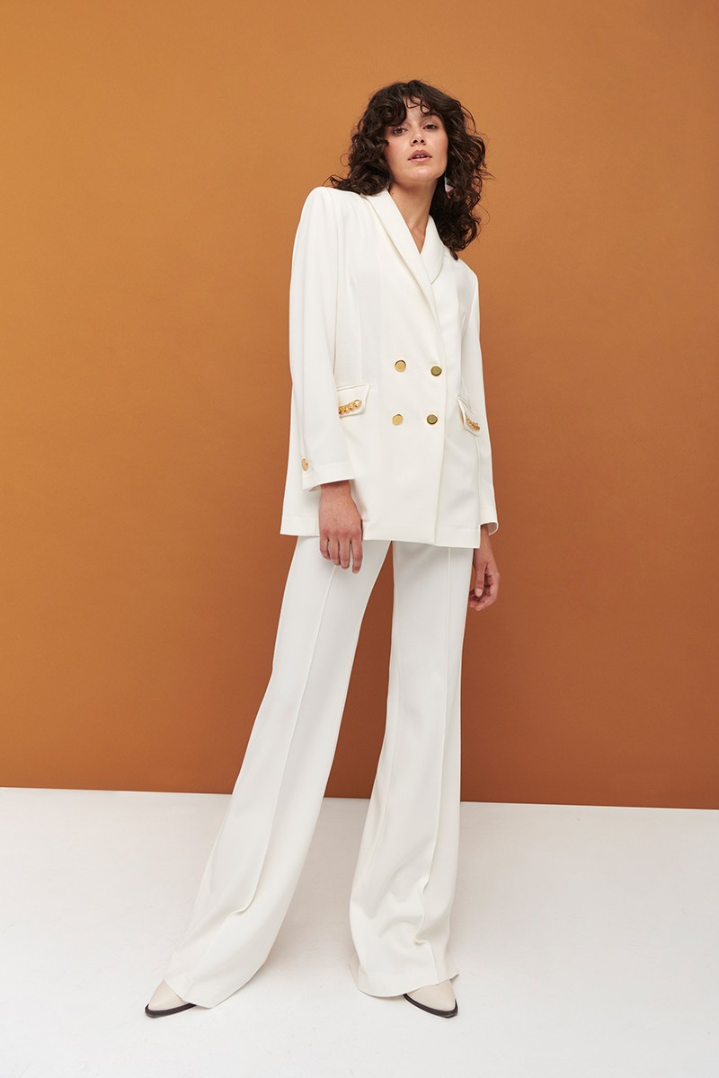 comprar online Pantalón palazzo blanco con cadena