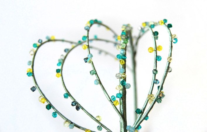 diadema para boda de pedreria y cristales en tonos verdes y amarillos de taneke en apparentia