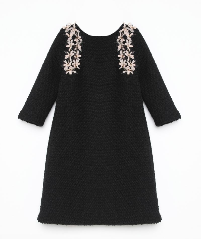 vestido corto negro de baguilla de lana con lazos adorno chanel