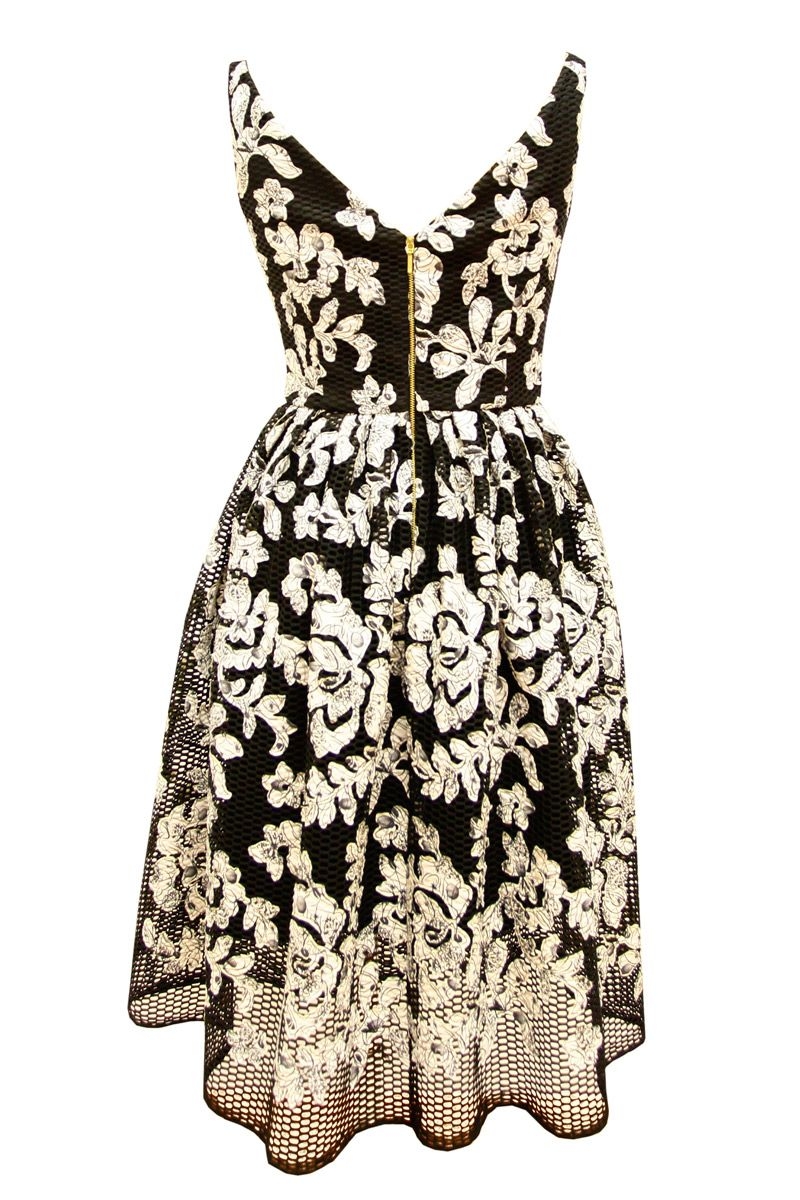 vestido de vuelo midi de flores de invitada de boda fiesta evento coctel bautizo comunion de laura caicoya en apparentia