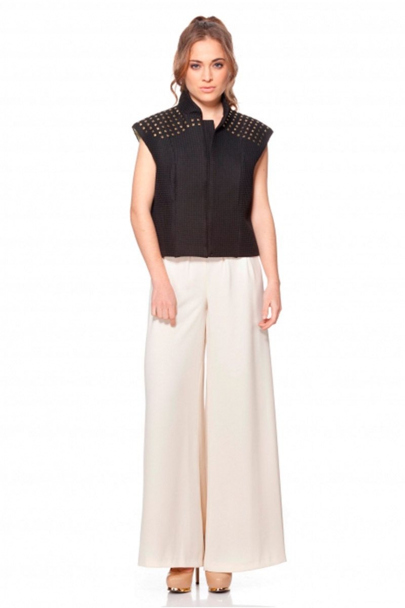 chaleco negro con tachuelas doradas para fiesta nochevieja evento de rocknrom en apparentia